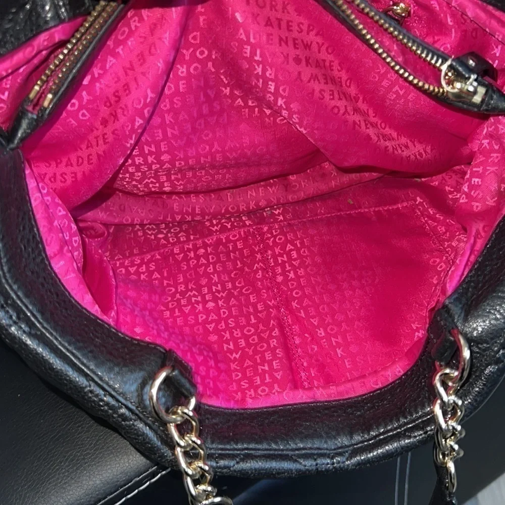 Black Kate Spade purse silver chain straps, pink interior